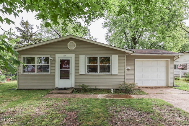 521 Elmhurst Pl, Whiteland, IN 46184 - view of front of home featuring driveway, a garage, and a front yard