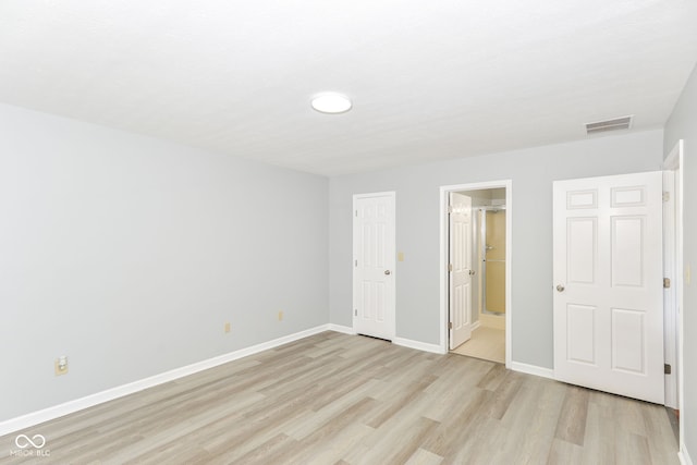 12289 Charing Cross Rd, Carmel, IN 46033 - unfurnished bedroom featuring light wood-style flooring, baseboards, and recessed lighting