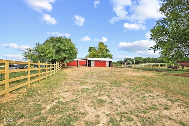 5594 S County Road 550 E, Greencastle, IN 46135 - view of yard with an outdoor structure, a view of rural / pastoral area, and an outbuilding