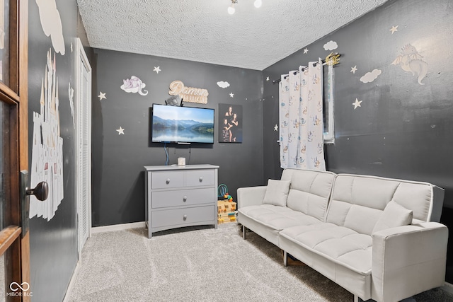 5594 S County Road 550 E, Greencastle, IN 46135 - sitting room featuring carpet flooring, a textured ceiling, and baseboards