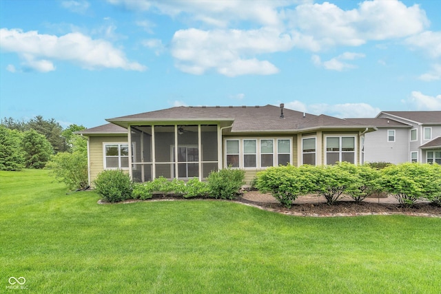 16071 Prince Ct, Noblesville, IN 46062 - rear view of property with a lawn, a sunroom, and roof with shingles