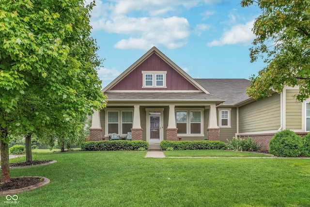 16071 Prince Ct, Noblesville, IN 46062 - craftsman-style home featuring brick siding, a front lawn, a porch, and board and batten siding