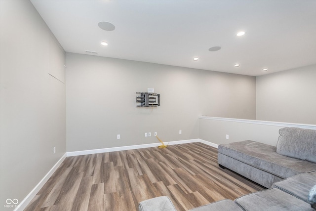 16071 Prince Ct, Noblesville, IN 46062 - unfurnished living room with wood finished floors, recessed lighting, and baseboards