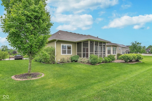 16071 Prince Ct, Noblesville, IN 46062 - back of house with a yard and a sunroom