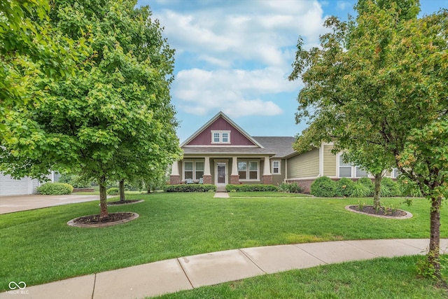 16071 Prince Ct, Noblesville, IN 46062 - craftsman-style home featuring brick siding, a front yard, concrete driveway, and a porch
