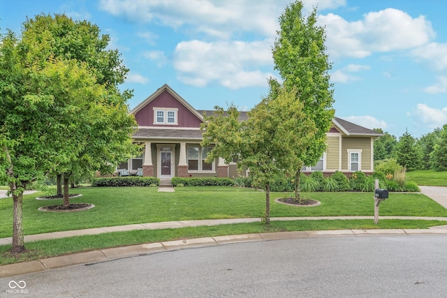 16071 Prince Ct, Noblesville, IN 46062 - view of front of property with a front lawn, brick siding, and roof with shingles
