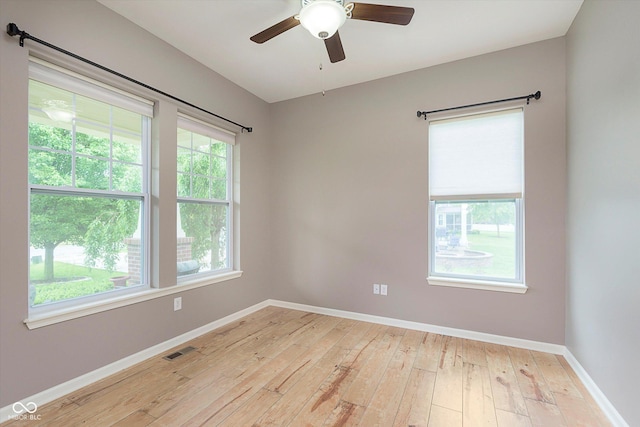 16071 Prince Ct, Noblesville, IN 46062 - empty room featuring light wood-style flooring, baseboards, and a ceiling fan
