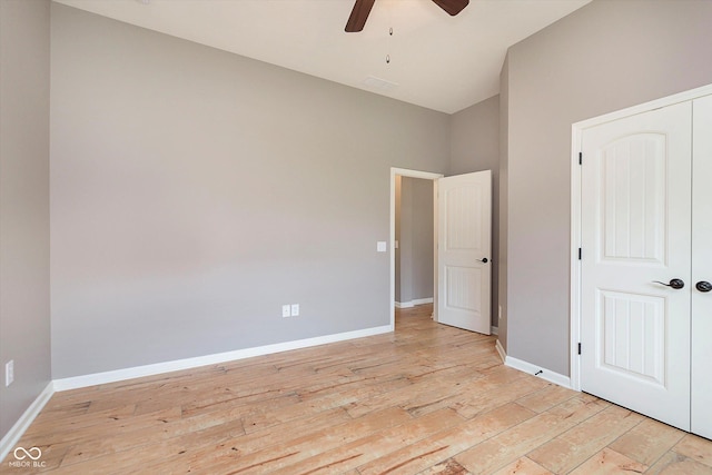 16071 Prince Ct, Noblesville, IN 46062 - unfurnished bedroom featuring light wood-style flooring, baseboards, a ceiling fan, vaulted ceiling, and a closet