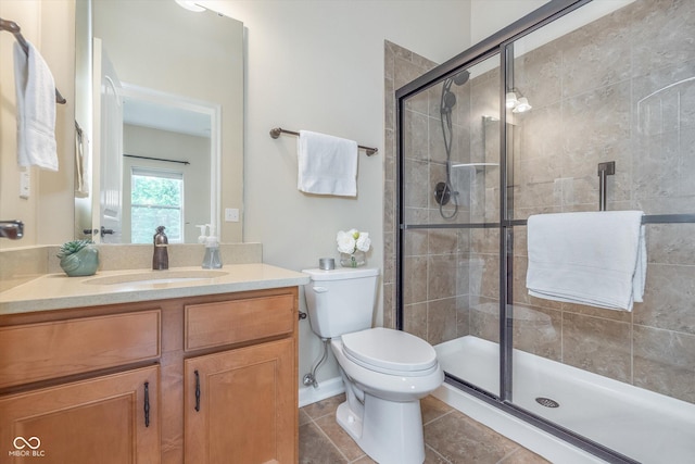 16071 Prince Ct, Noblesville, IN 46062 - full bathroom featuring a shower stall, vanity, toilet, and tile patterned flooring