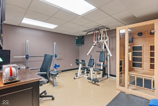 7978 Park Meadows Dr, Brownsburg, IN 46112 - workout room with a paneled ceiling and baseboards