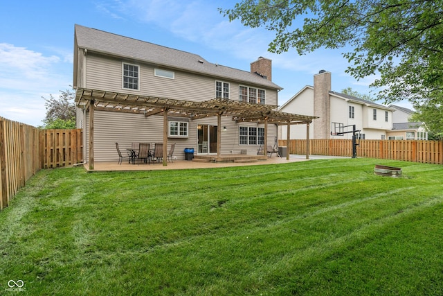 7978 Park Meadows Dr, Brownsburg, IN 46112 - rear view of house featuring a pergola, a patio area, and a chimney