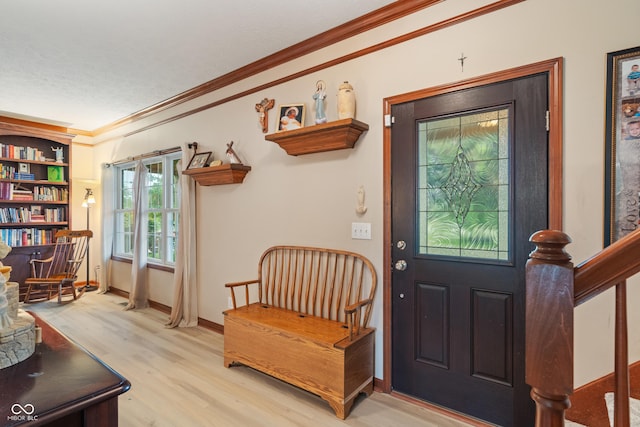 7978 Park Meadows Dr, Brownsburg, IN 46112 - foyer entrance featuring wood finished floors, crown molding, and baseboards