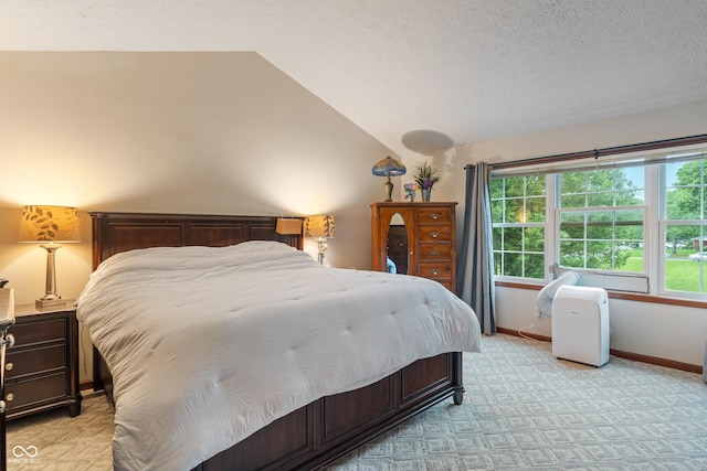 7978 Park Meadows Dr, Brownsburg, IN 46112 - bedroom featuring light carpet, vaulted ceiling, baseboards, and a textured ceiling