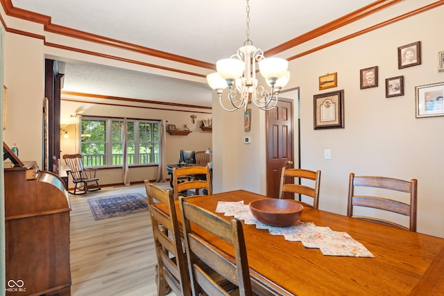 7978 Park Meadows Dr, Brownsburg, IN 46112 - dining room featuring a chandelier, light wood finished floors, and ornamental molding