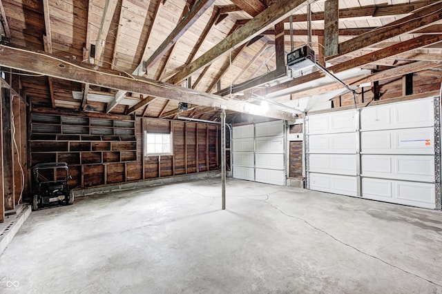 4621 E 17th St, Indianapolis, IN 46218 - garage featuring a garage door opener
