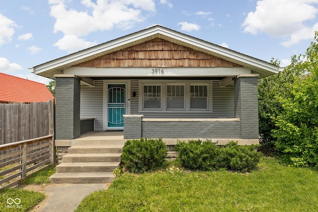 3916 E 10th St, Indianapolis, IN 46201 - view of front of property with a porch