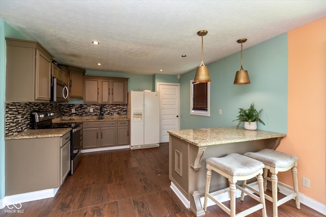2519 N Boehning St, Indianapolis, IN 46219 - kitchen with stainless steel appliances, dark wood-type flooring, decorative backsplash, decorative light fixtures, and baseboards
