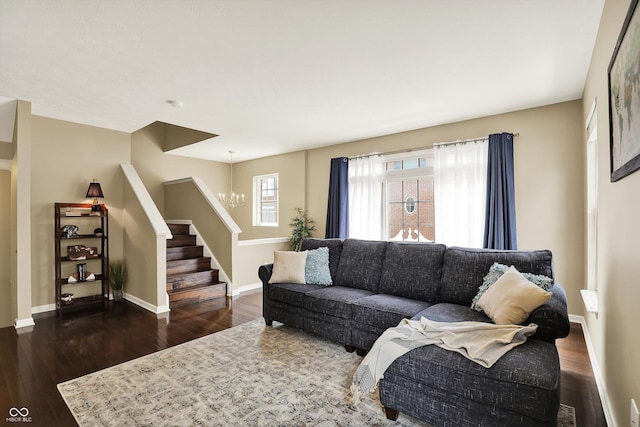 73 11th St NW, Carmel, IN 46032 - living area with a chandelier, dark wood finished floors, stairway, and baseboards
