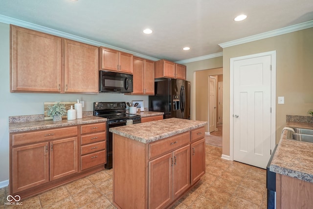 695 Overcup St, Westfield, IN 46074 - kitchen with black appliances, crown molding, recessed lighting, a sink, and a kitchen island