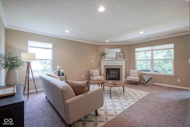 695 Overcup St, Westfield, IN 46074 - living room featuring light carpet, recessed lighting, baseboards, a glass covered fireplace, and ornamental molding