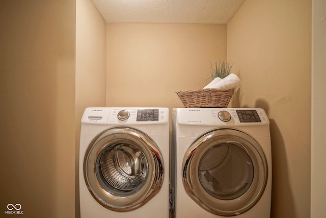 695 Overcup St, Westfield, IN 46074 - laundry area with separate washer and dryer and a textured ceiling