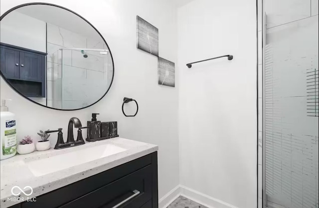 8744 Montery Ct, Indianapolis, IN 46226 - full bath featuring a shower stall, vanity, and baseboards