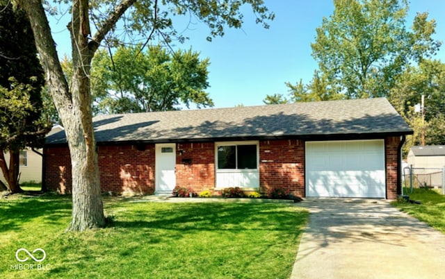 8744 Montery Ct, Indianapolis, IN 46226 - single story home featuring brick siding, concrete driveway, a garage, and a shingled roof