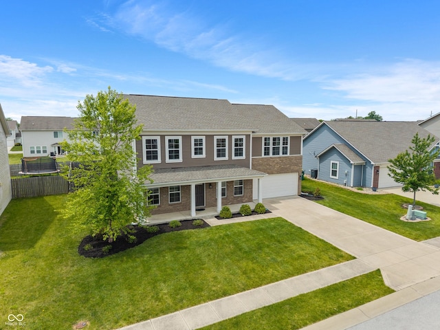 2626 Solidago Dr, Plainfield, IN 46168 - view of front of house featuring driveway, covered porch, a garage, brick siding, and a shingled roof