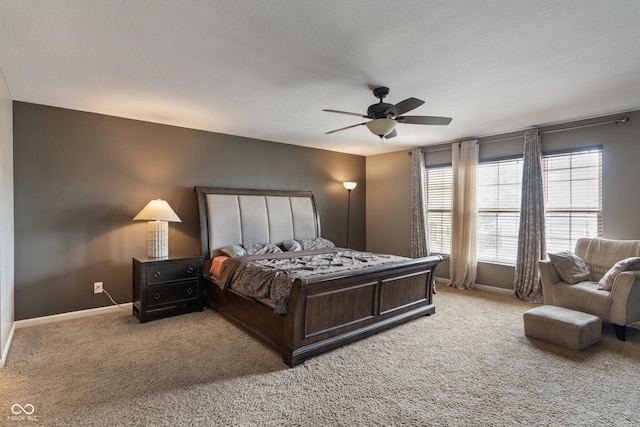 2626 Solidago Dr, Plainfield, IN 46168 - bedroom featuring light carpet, baseboards, and a ceiling fan