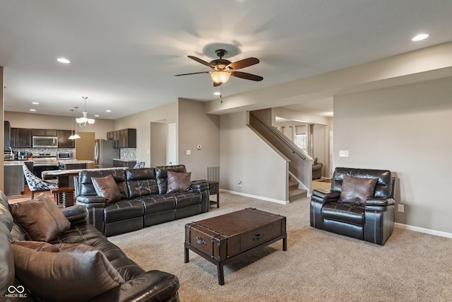 2626 Solidago Dr, Plainfield, IN 46168 - living area featuring baseboards, light carpet, stairway, ceiling fan, and recessed lighting