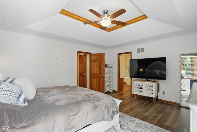 12335 Old Stone Dr, Indianapolis, IN 46236 - bedroom with a raised ceiling, wood finished floors, and a ceiling fan
