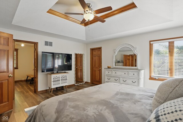 12335 Old Stone Dr, Indianapolis, IN 46236 - bedroom with a raised ceiling, wood finished floors, baseboards, and ceiling fan