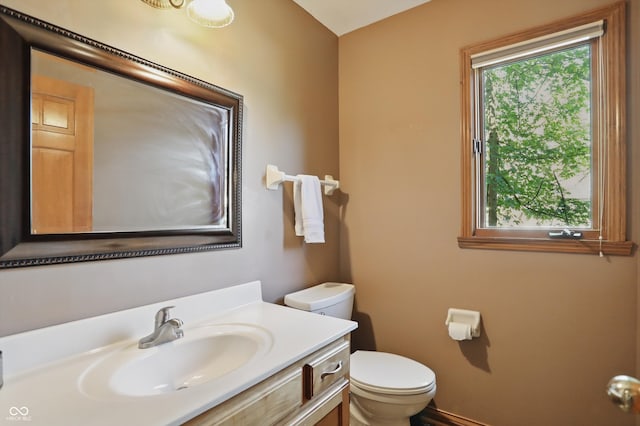 12335 Old Stone Dr, Indianapolis, IN 46236 - bathroom featuring toilet, vanity, and baseboards