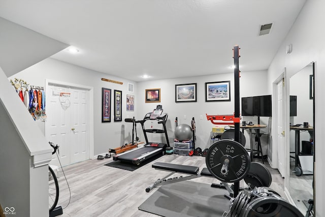 12335 Old Stone Dr, Indianapolis, IN 46236 - workout room featuring light wood finished floors and recessed lighting