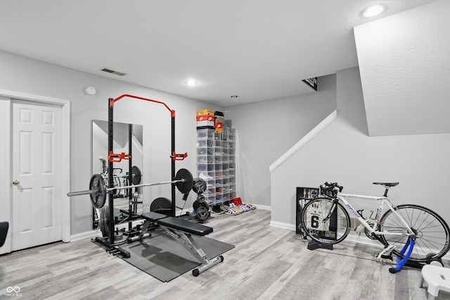 12335 Old Stone Dr, Indianapolis, IN 46236 - workout area featuring wood finished floors, baseboards, and recessed lighting