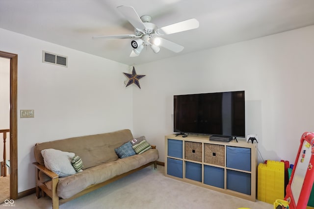 12335 Old Stone Dr, Indianapolis, IN 46236 - living room with carpet, a ceiling fan, and baseboards