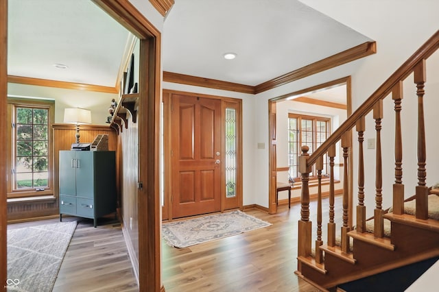 12335 Old Stone Dr, Indianapolis, IN 46236 - entryway with crown molding, stairs, light wood-style flooring, baseboards, and recessed lighting