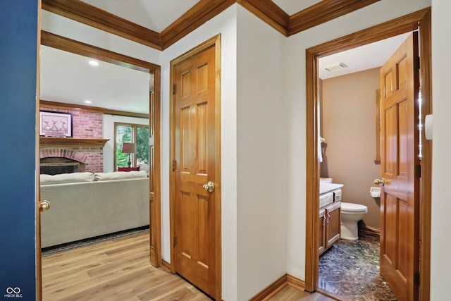 12335 Old Stone Dr, Indianapolis, IN 46236 - hall with ornamental molding, light wood-style floors, baseboards, and recessed lighting