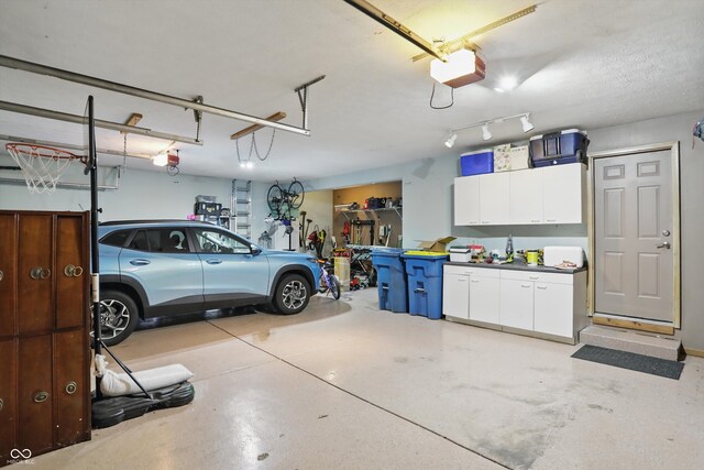 12335 Old Stone Dr, Indianapolis, IN 46236 - garage featuring a garage door opener