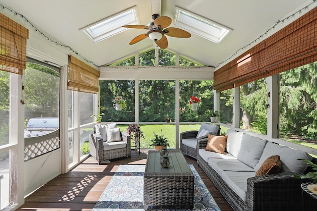 12335 Old Stone Dr, Indianapolis, IN 46236 - sunroom / solarium with a skylight, ceiling fan, an outdoor hangout area, and vaulted ceiling