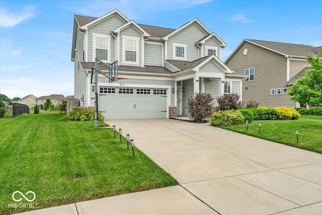 13495 Forest Glade Dr, Fishers, IN 46037 - view of front facade featuring driveway, an attached garage, a front lawn, and a shingled roof