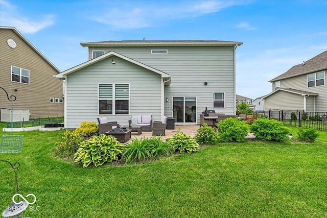 13495 Forest Glade Dr, Fishers, IN 46037 - back of property with an outdoor living space with a fire pit and a patio area