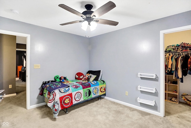 1664 Woodside Cir, Franklin, IN 46131 - carpeted bedroom with a spacious closet, ceiling fan, and a closet