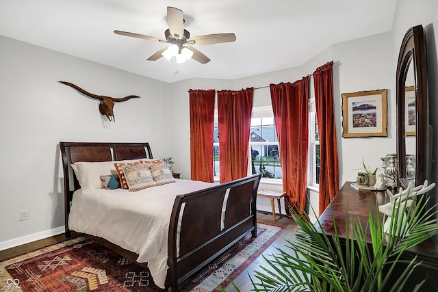1664 Woodside Cir, Franklin, IN 46131 - bedroom with wood finished floors and a ceiling fan