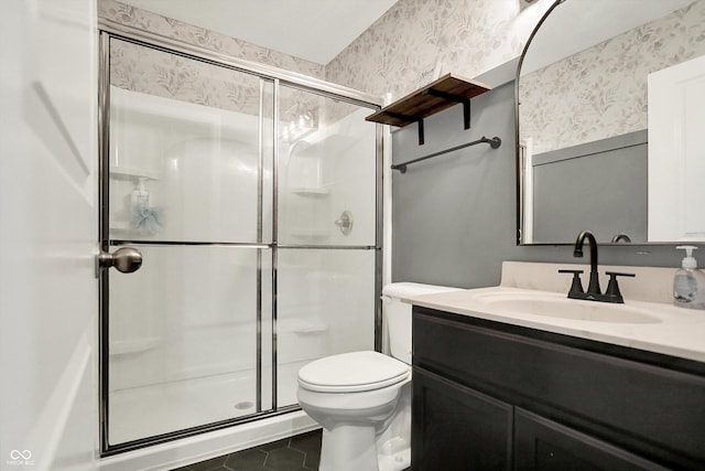 1664 Woodside Cir, Franklin, IN 46131 - bathroom featuring wallpapered walls, a stall shower, vanity, and tile patterned flooring