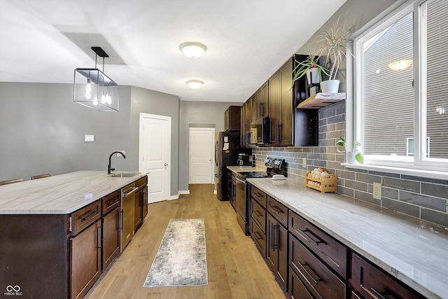 1664 Woodside Cir, Franklin, IN 46131 - kitchen featuring range with electric cooktop, tasteful backsplash, black microwave, light wood finished floors, and open shelves