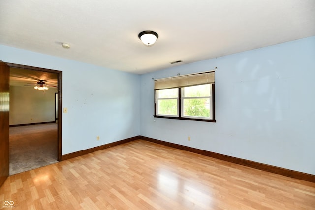 18906 Crestview Ct, Westfield, IN 46074 - spare room with light wood-type flooring, baseboards, and a ceiling fan