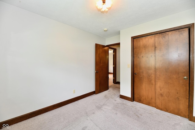 18906 Crestview Ct, Westfield, IN 46074 - unfurnished bedroom with light carpet, a closet, and baseboards