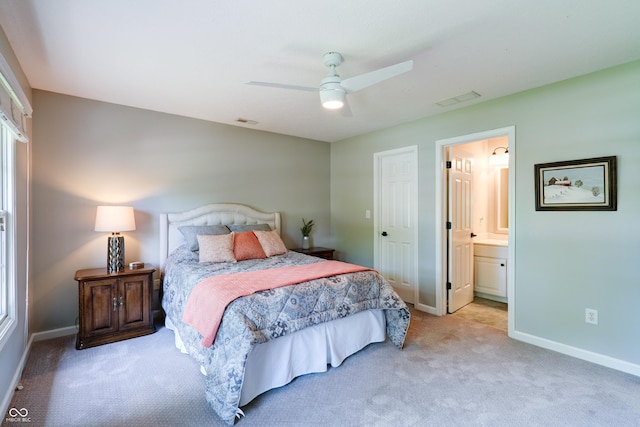 9154 Sargent Manor Ct, Indianapolis, IN 46256 - bedroom with carpet flooring, baseboards, connected bathroom, and ceiling fan