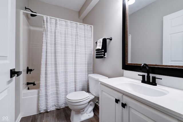 9154 Sargent Manor Ct, Indianapolis, IN 46256 - bathroom featuring vanity, toilet, wood finished floors, and shower / bath combo with shower curtain